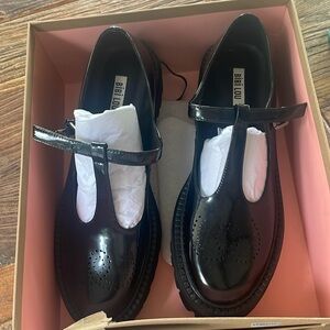 Adorable Anthropologie Bibi Lou Mary Jane’s.Never worn.Lug sole /shiny black.